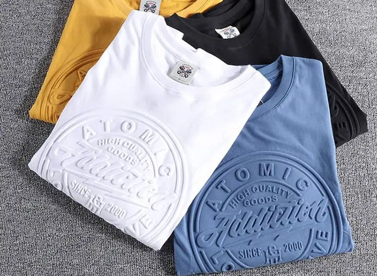 Raised tonal designs on folded shirts