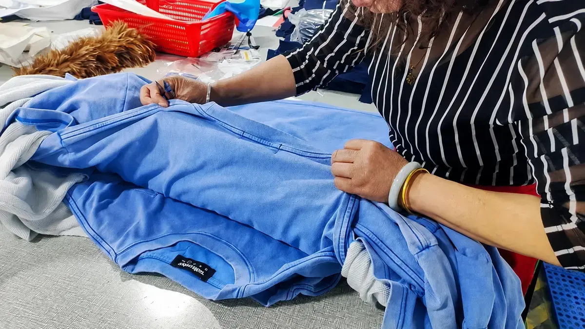 Developing and reviewing a coordinated custom tracksuit sample