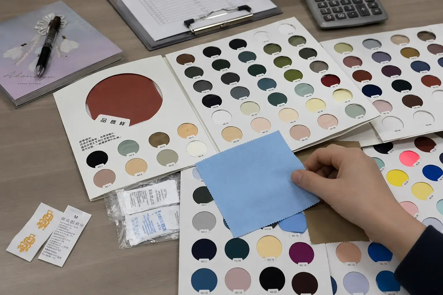 Fabric, GSM, color, trim, and label selection for custom pants
