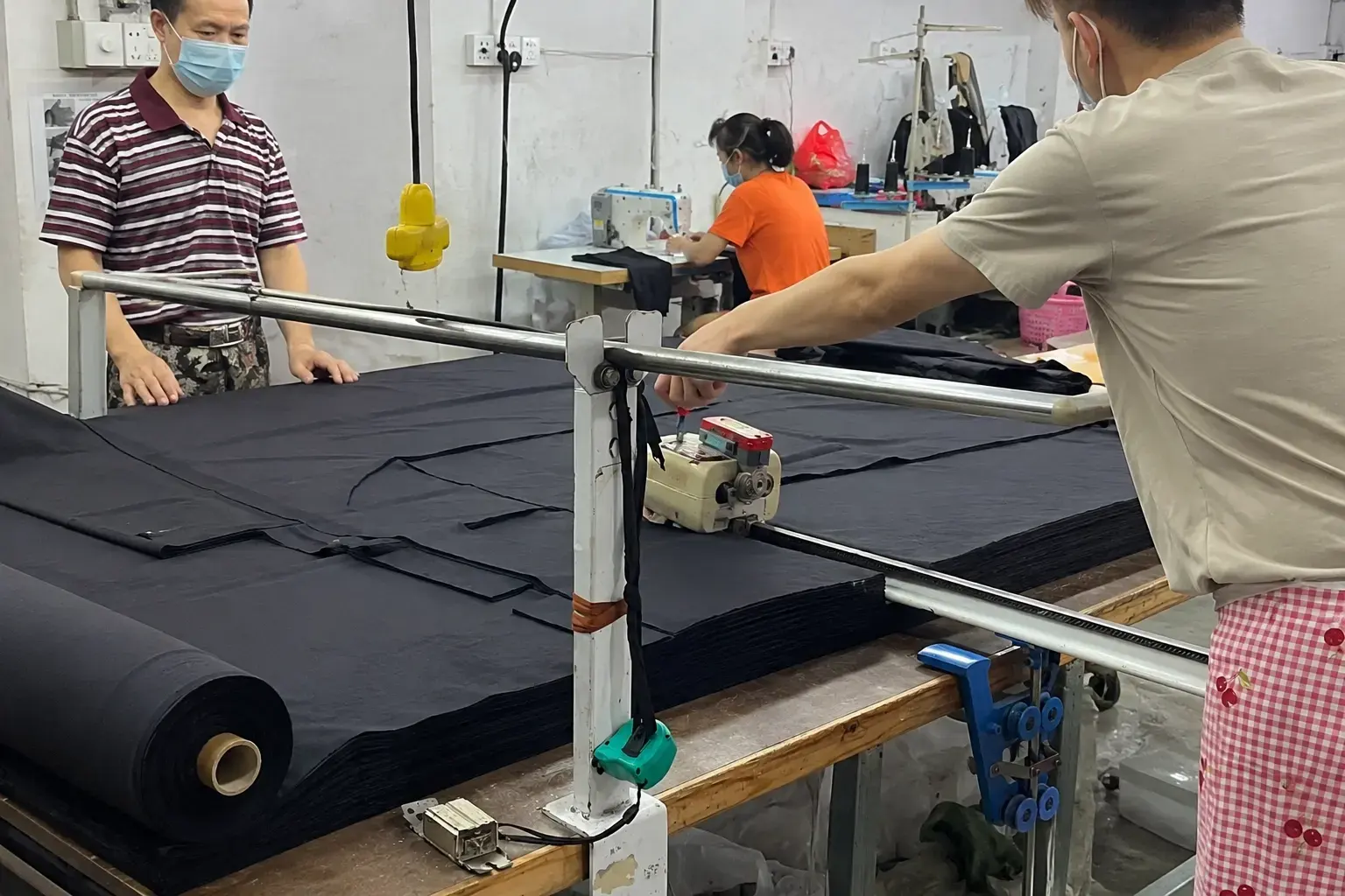 Cutting and sewing during custom pants bulk production
