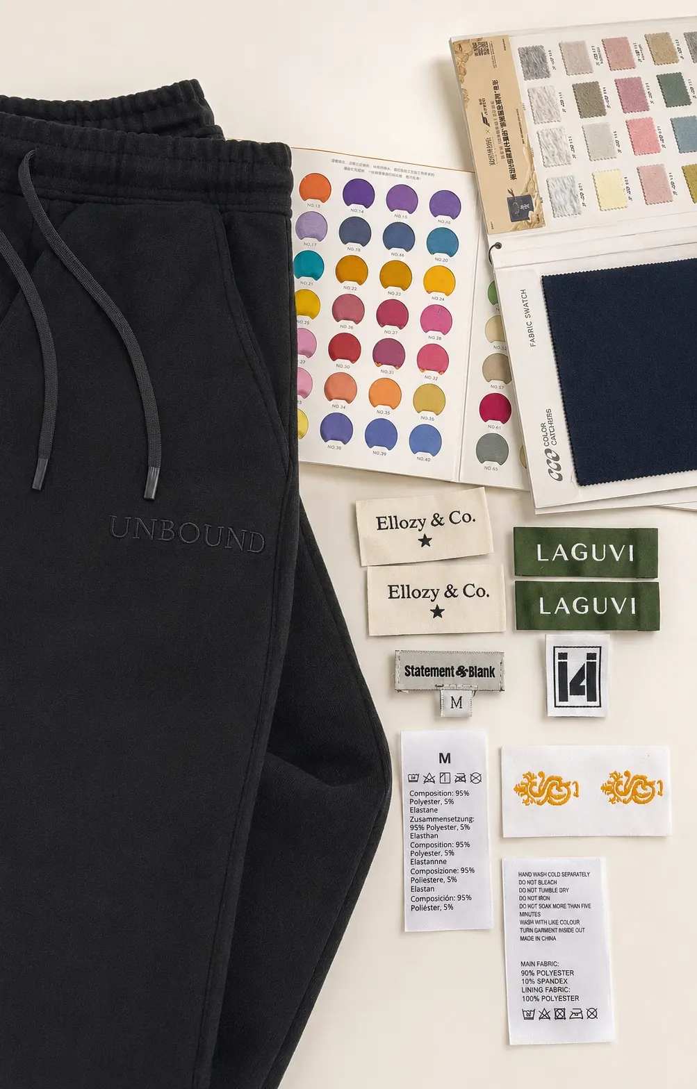 Custom pants, fabric color cards, woven labels, care labels, and embroidery samples