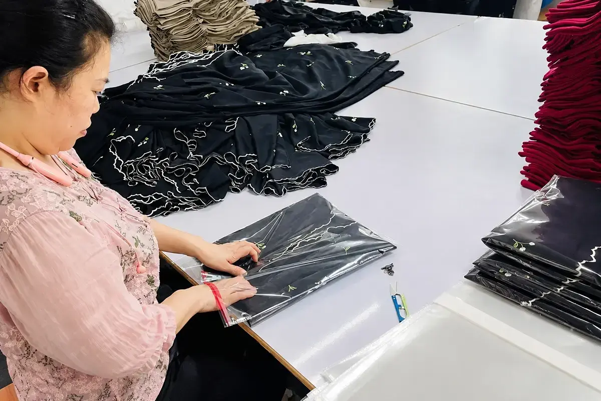 Finished custom dress quality inspection and packing before shipment