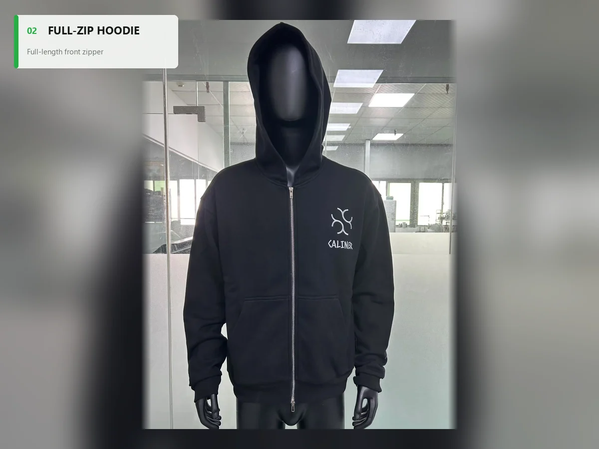 Black full-zip hoodie with a centered front zipper and split pockets on a mannequin